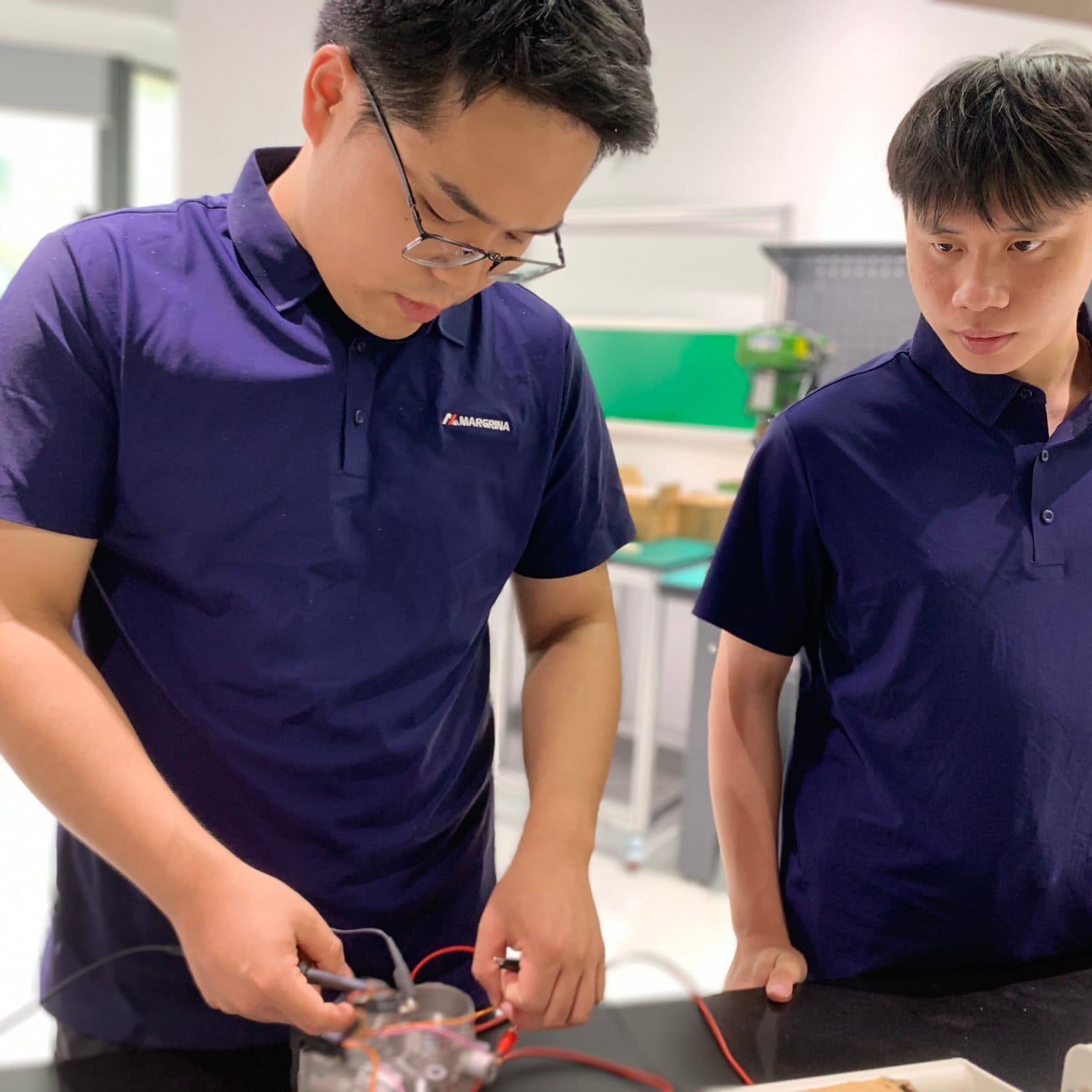 Engineers working at design workstations